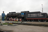 Steam locomotive L-1585 (Lebedyansky)and monument locodriver in depo Povorino.